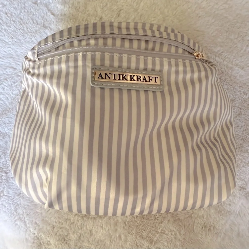 Antik Kraft small gray vegan leather makeup bag/ clutch